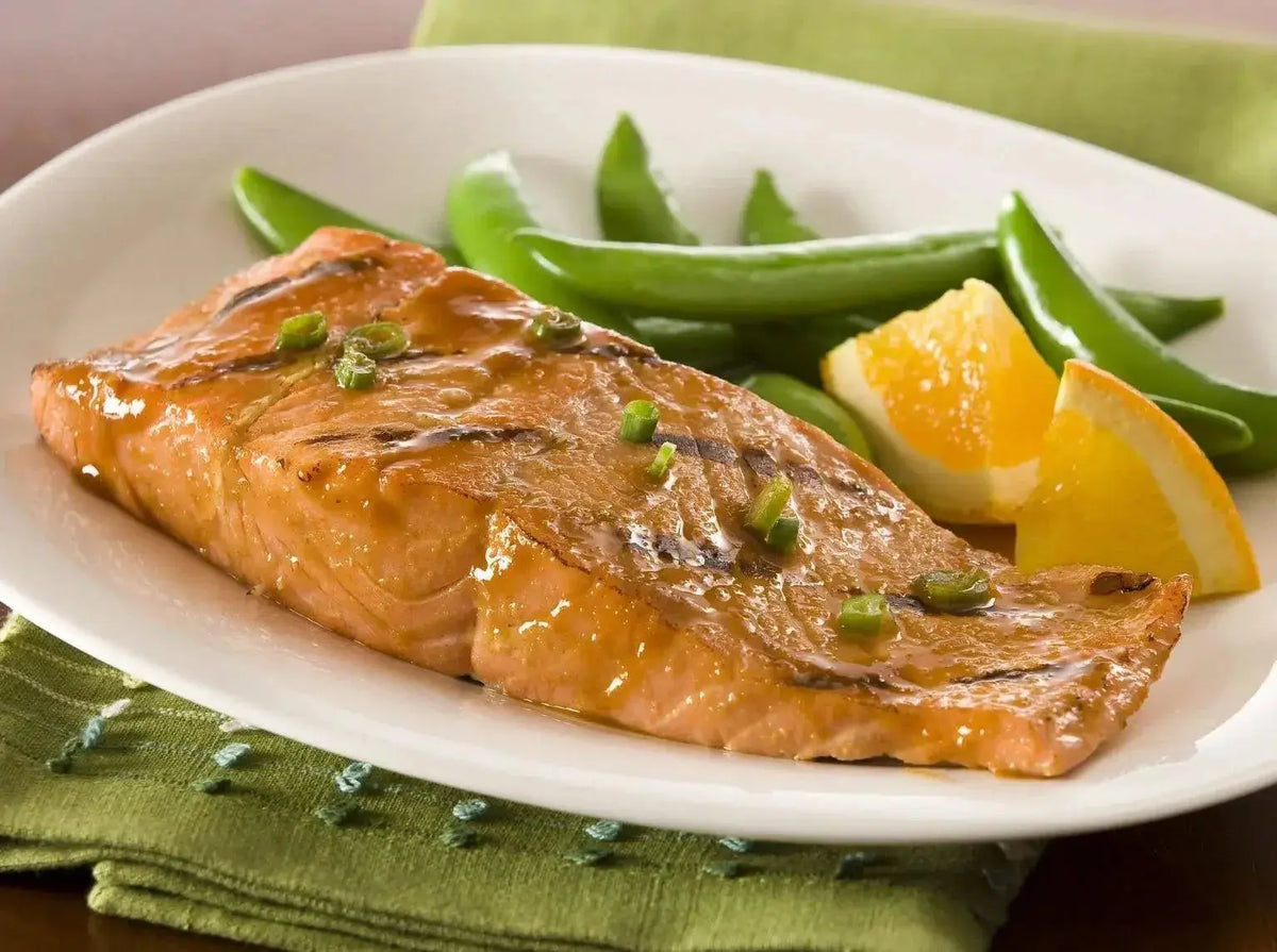 Baked Salmon Delight: Blood Orange EVOO and Honey Marinade Recipe - Tastefully Olive