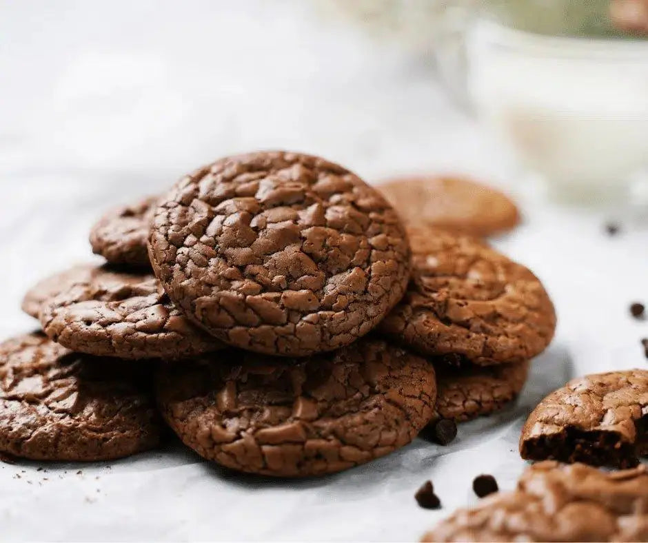 Rich chocolate cookies with cracked tops, perfect for pairing with premium olive oil desserts